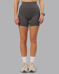Woman wearing Fusion Ultra High-Rise 6" Short - Dark Storm | Model:Lillie | Size:S