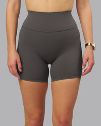 Woman wearing Fusion Ultra High-Rise 6" Short - Dark Storm | Model:Lillie | Size:S