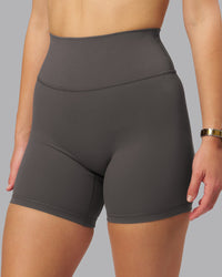 Woman wearing Fusion Ultra High-Rise 6" Short - Dark Storm | Model:Lillie | Size:S