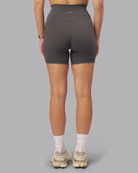 Woman wearing Fusion Ultra High-Rise 6" Short - Dark Storm | Model:Lillie | Size:S