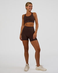 Woman wearing Fusion Sports Bra 2.0 - Hot Chocolate | Model:Amity | Size:S