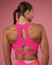 Woman wearing Fusion Sports Bra 2.0 - Ultra Pink | Model:Hannah | Size:S