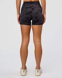 Woman wearing Fusion Ultra High-Rise 4" Short Pockets - Black Tie Dye | Set:true | Angle:back | Model:Amity | Size:S | Thumbnail Index: 3
