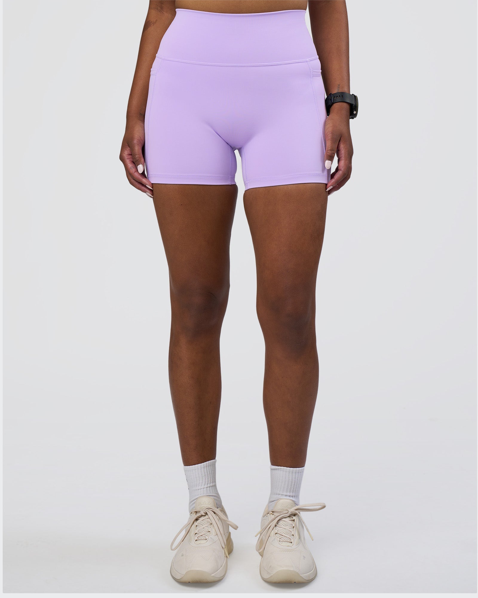 Woman wearing Fusion Ultra High-Rise 4" Short Pockets - Pale Lilac | Model:Rica | Size:S