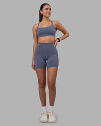 Woman wearing Fusion Ultra High-Rise 6" Short - Night Shadow | Model:Rhiley | Size:S