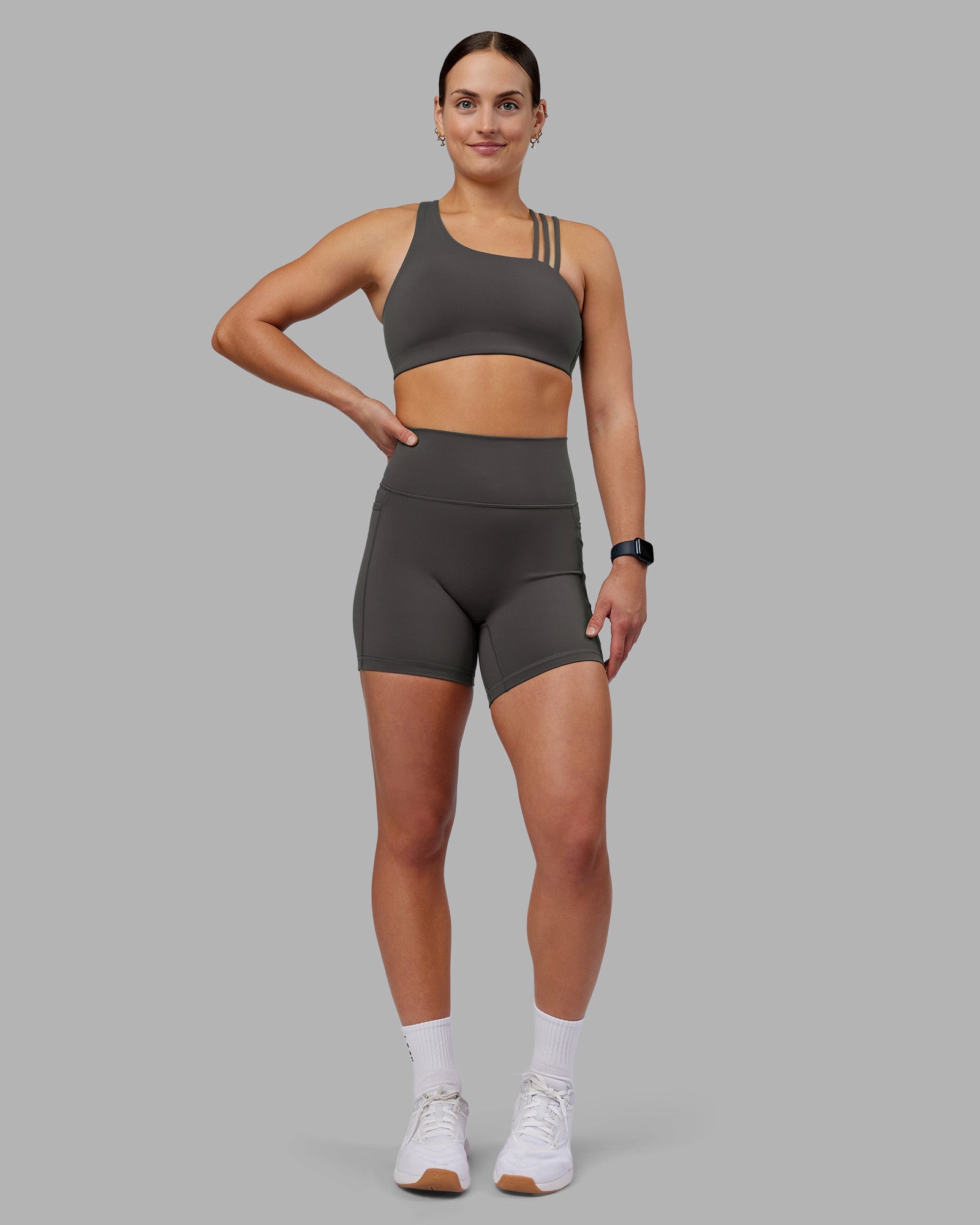 Woman wearing Fusion Ultra High-Rise 6" Short Pockets - Dark Storm | Model:Keisha | Size:S