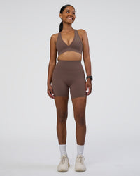 Woman wearing Fusion Ultra High-Rise 6" Short Pockets - Peppercorn | Model:Rica | Size:S