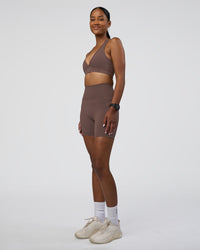 Woman wearing Fusion Ultra High-Rise 6" Short Pockets - Peppercorn | Model:Rica | Size:S