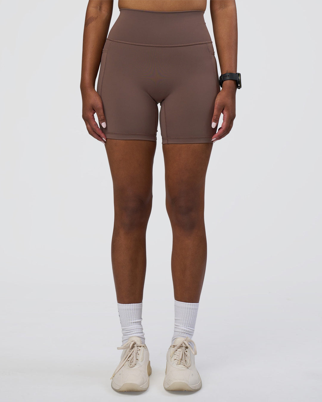 Woman wearing Fusion Ultra High-Rise 6&quot; Short Pockets - Peppercorn | Model:Rica | Size:S