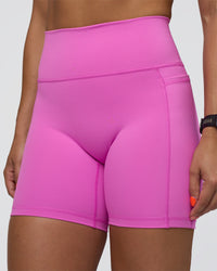 Woman wearing Fusion Ultra High-Rise 6" Short Pockets - Ultra Fuchsia | Model:Abbey | Size:S