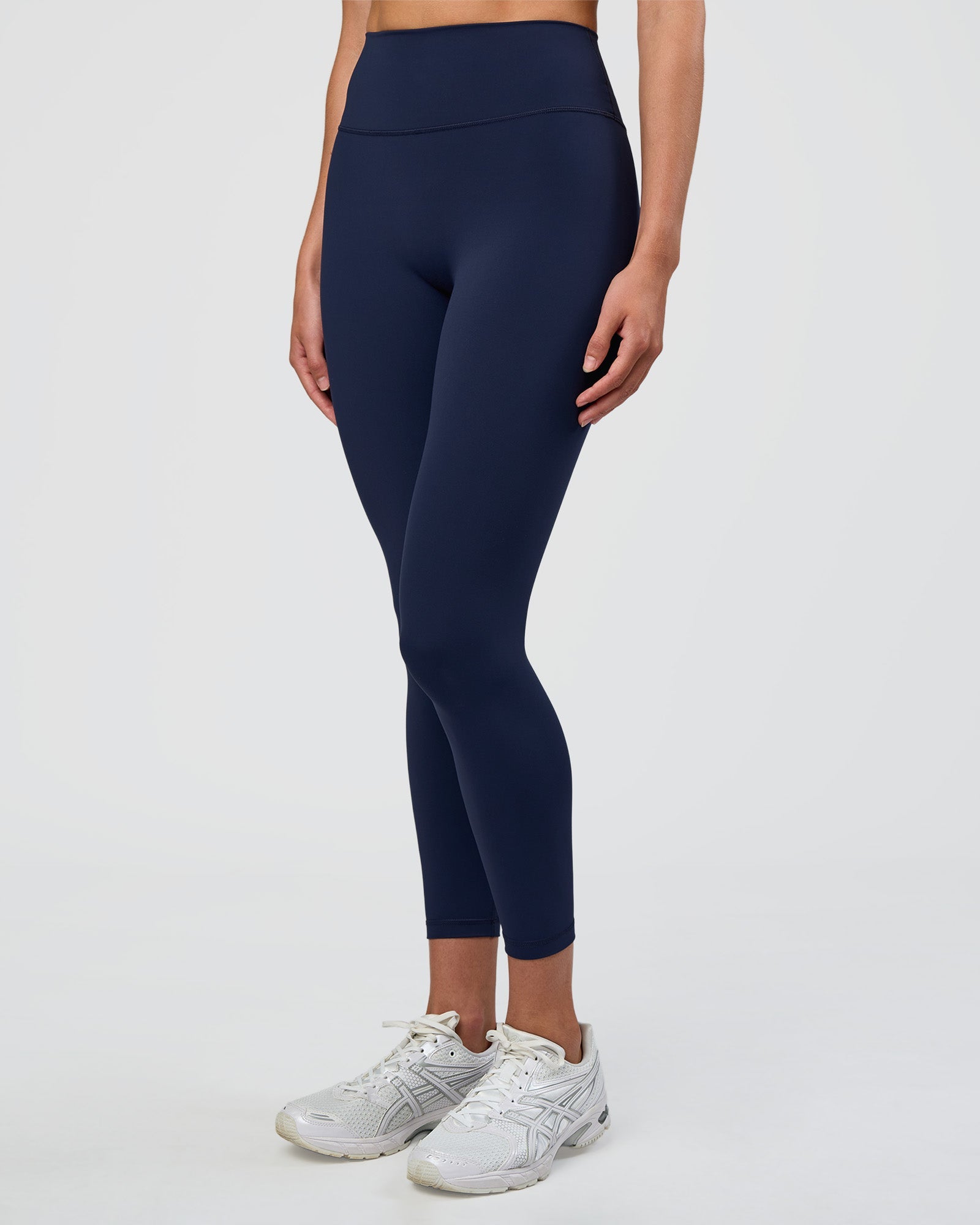 Woman wearing Fusion Ultra High-Rise 7/8 Legging - Future Navy | Model:Evie | Size:S