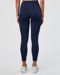 Woman wearing Fusion Ultra High-Rise 7/8 Legging - Future Navy | Model:Evie | Size:S