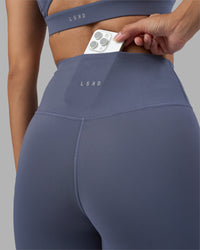 Woman wearing Fusion Ultra High-Rise 7/8 Legging - Night Shadow | Model:Rhiley | Size:S | Thumbnail Index: 1