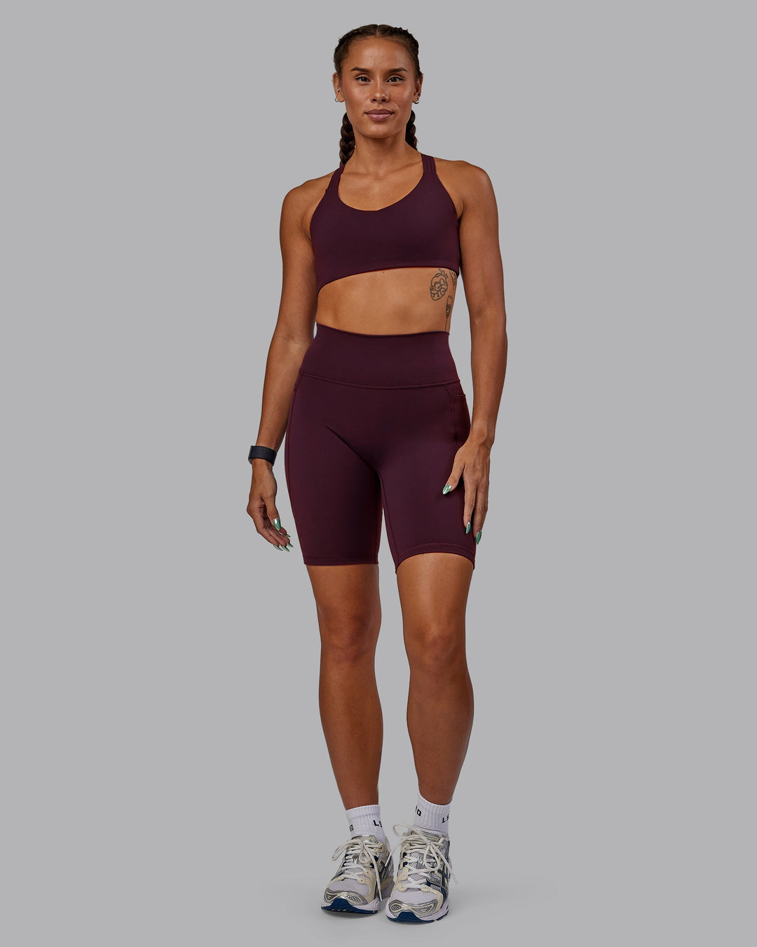 Woman wearing Fusion Ultra High-Rise 9&quot; Short Pockets - Cherry Lacquer | Model:Vanessa | Size:S