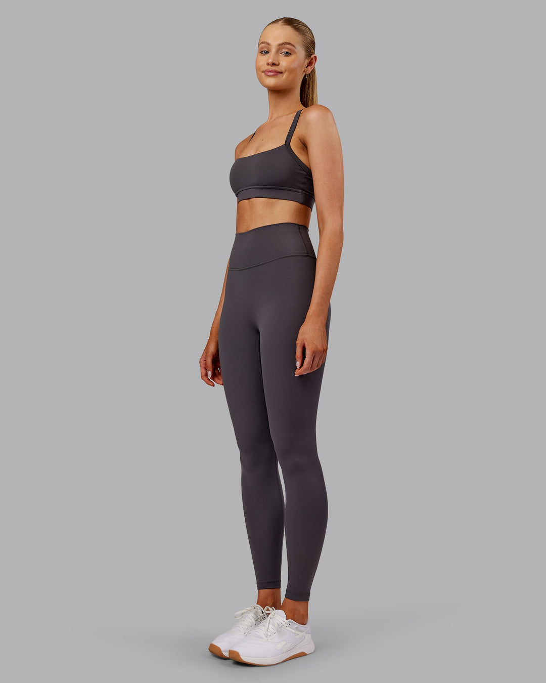 Woman wearing Fusion Ultra High-Rise Full Length Legging - Dark Storm | Model:Ella | Size:S