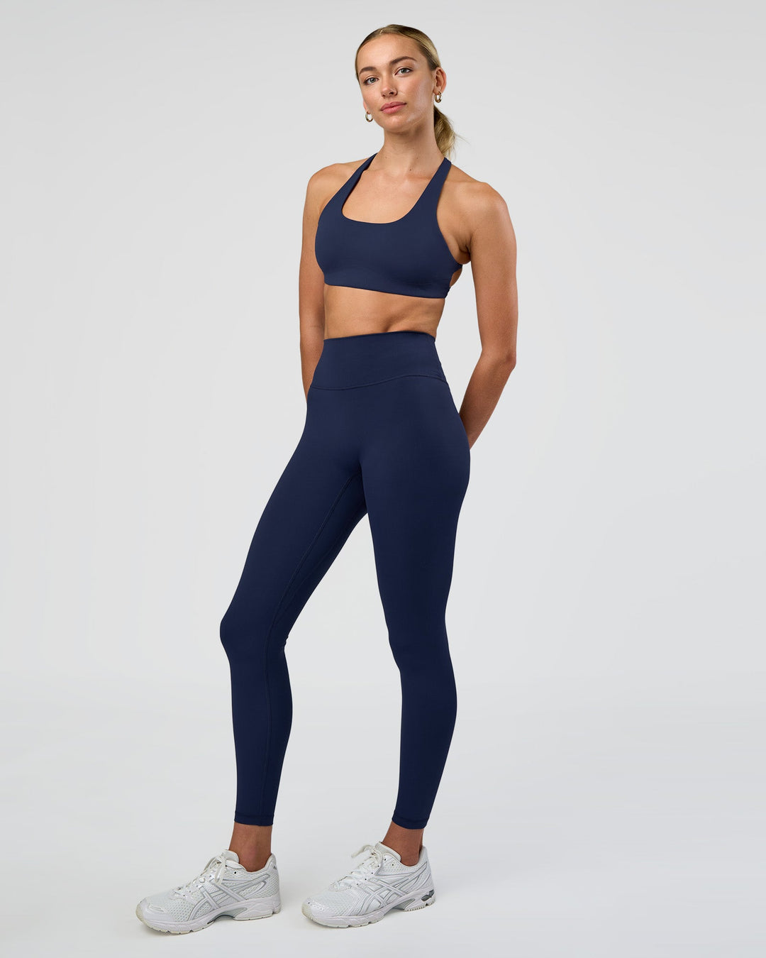 Woman wearing Fusion Ultra High-Rise Full Length Legging - Future Navy | Model:Evie | Size:S