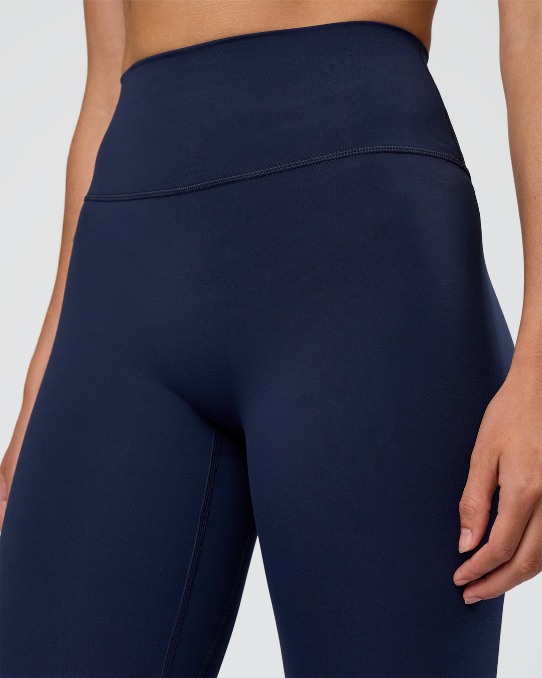 Woman wearing Fusion Ultra High-Rise Full Length Legging - Future Navy | Model:Evie | Size:S