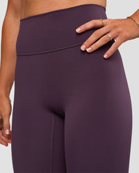 Woman wearing Fusion Ultra High-Rise Full Length Legging - Midnight Plum | Model:Emelia | Size:S
