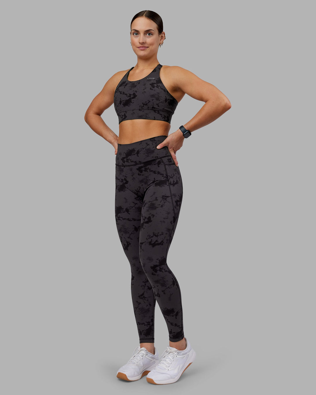Woman wearing Fusion Ultra High-Rise Full Length Legging Pockets - Black Tie Dye | Model:Keisha | Size:S