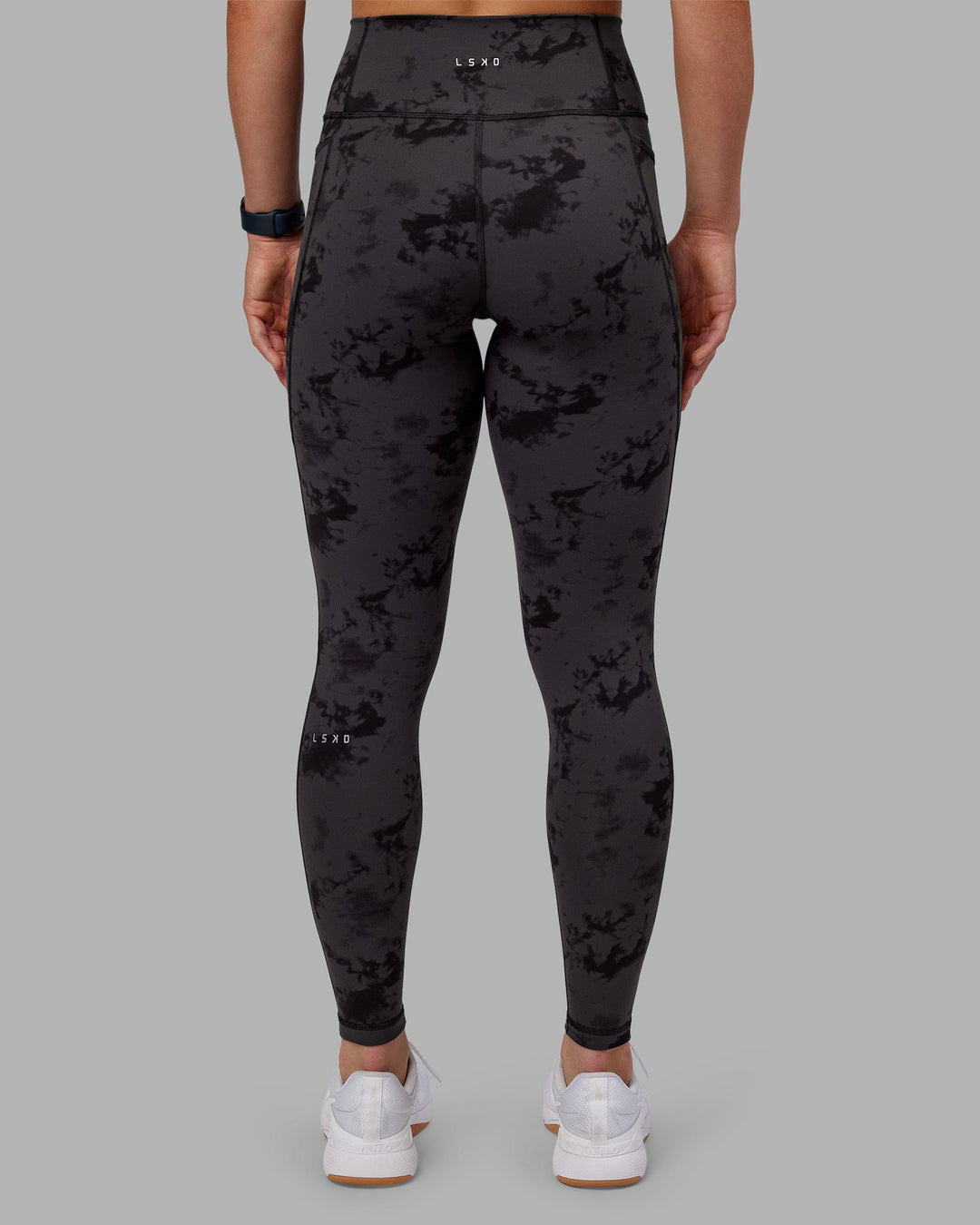 Woman wearing Fusion Ultra High-Rise Full Length Legging Pockets - Black Tie Dye | Model:Keisha | Size:S