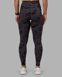Woman wearing Fusion Ultra High-Rise Full Length Legging Pockets - Black Tie Dye | Model:Keisha | Size:S
