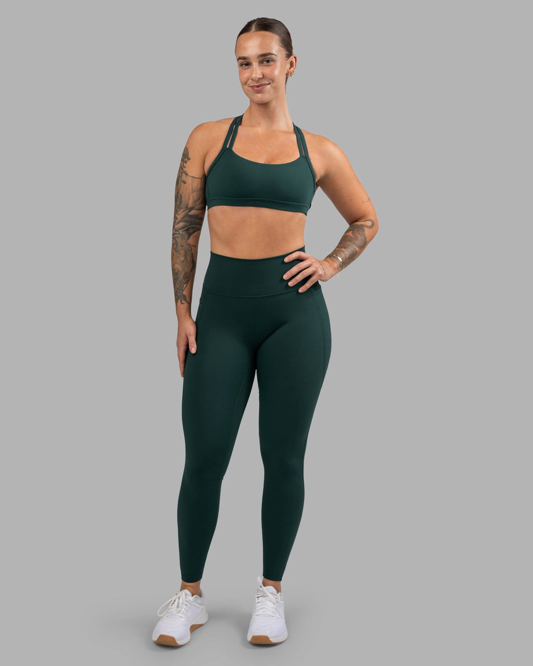 Woman wearing Fusion Ultra High-Rise Full Length Legging Pockets - Dark Moss | Model:Robyn | Size:S