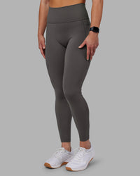 Woman wearing Fusion Ultra High-Rise Full Length Legging Pockets - Dark Storm | Model:Keisha | Size:S | Thumbnail Index: 4