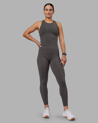 Woman wearing Fusion Ultra High-Rise Full Length Legging Pockets - Dark Storm | Model:Keisha | Size:S | Thumbnail Index: 0