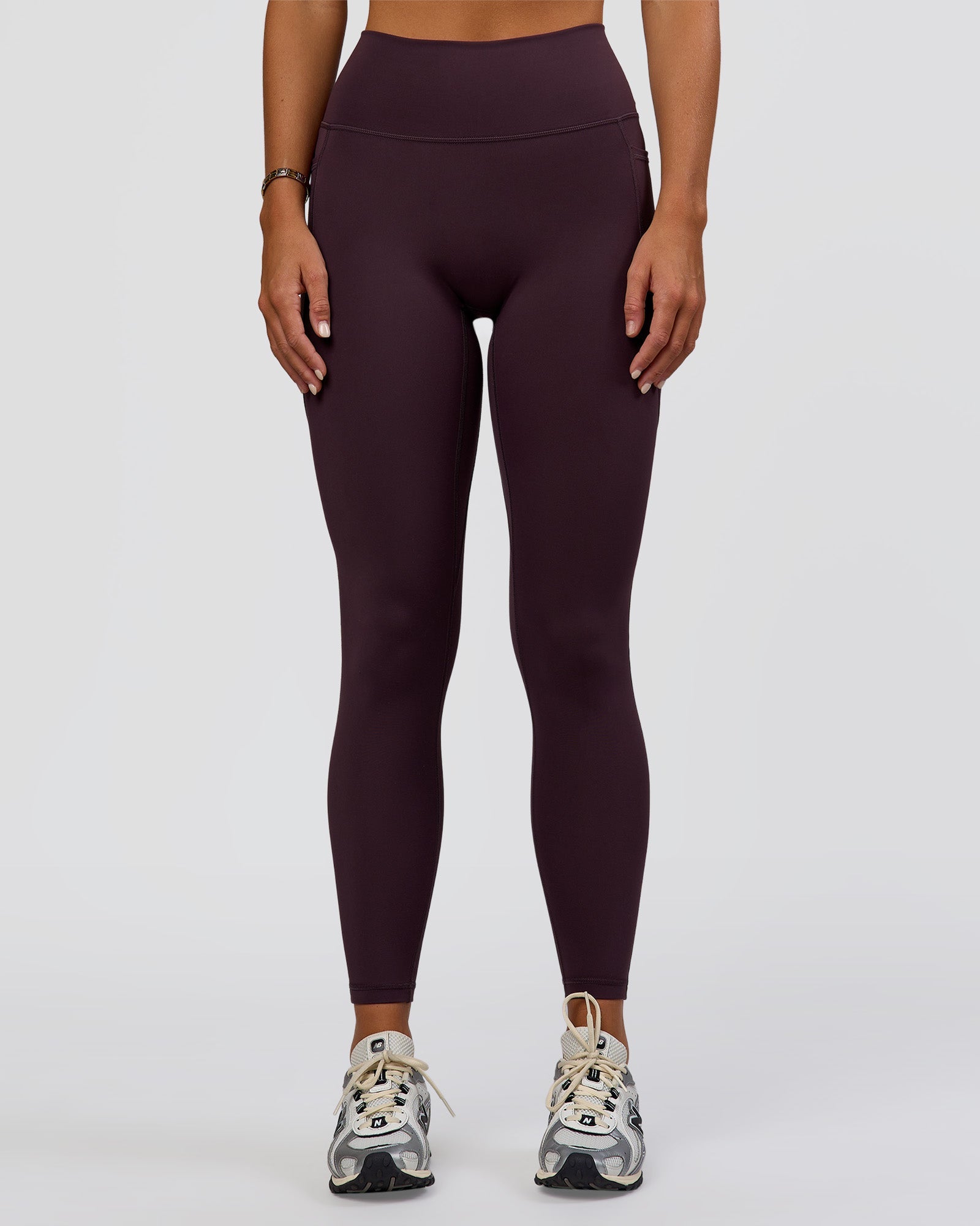 Woman wearing Fusion Ultra High-Rise Full Length Legging Pockets - Midnight Plum | Model:Amity | Size:S