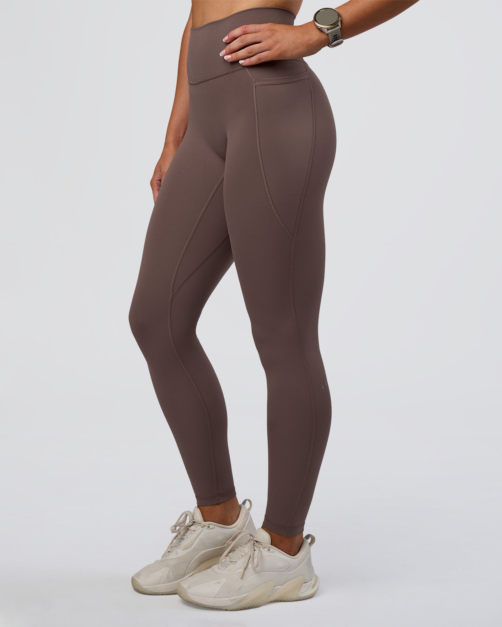 Woman wearing Fusion Ultra High-Rise Full Length Legging Pockets - Peppercorn | Model:Emelia | Size:S