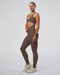 Woman wearing Fusion Ultra High-Rise Full Length Legging Pockets - Peppercorn | Model:Emelia | Size:S