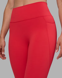 Woman wearing Fusion Ultra High-Rise Full Length Legging Pockets - Scarlet | Model:Sophie | Size:S