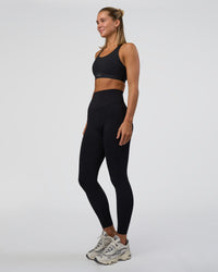 Woman wearing Fusion Sports Bra 2.0 - Black | Model:Amity | Size:S | Thumbnail Index: 6