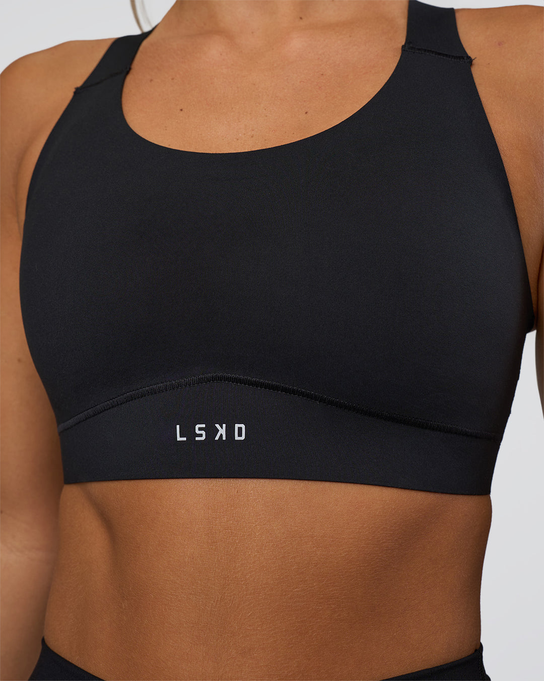 Woman wearing Fusion Sports Bra 2.0 - Black | Model:Amity | Size:S - view 6