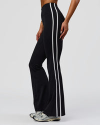 Woman wearing Fusion V-Contour Bind High-Rise Flared Legging - Black-white | Model:Bianca | Size:S | Thumbnail Index: 0