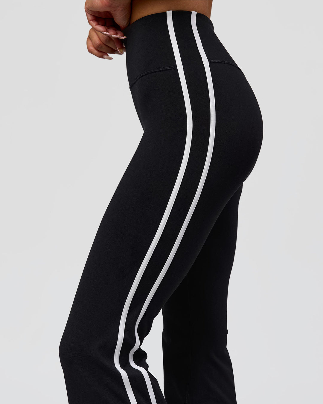 Woman wearing Fusion V-Contour Bind High-Rise Flared Legging - Black-white | Model:Bianca | Size:S - view 8