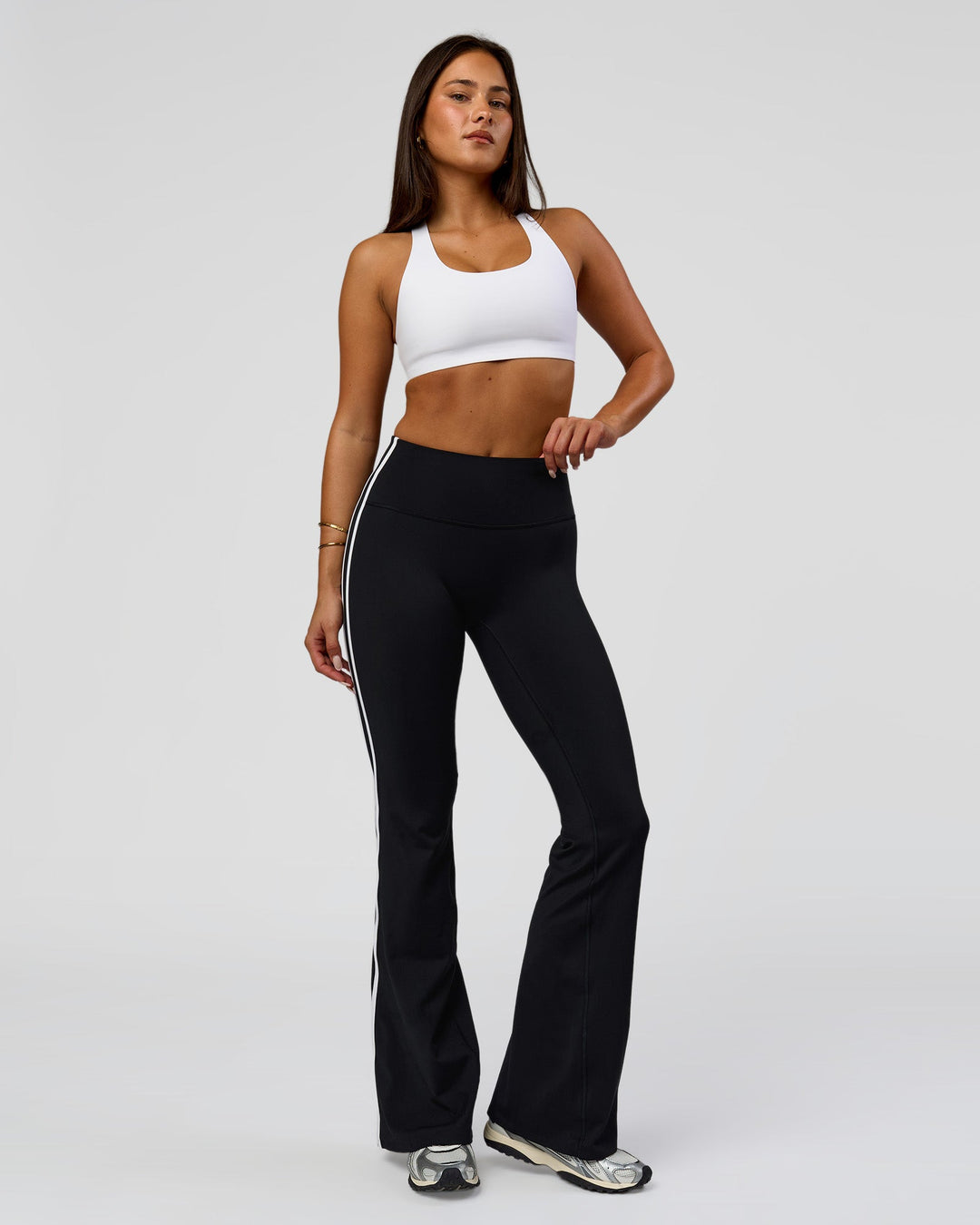 Woman wearing Fusion V-Contour Bind High-Rise Flared Legging - Black-white | Model:Bianca | Size:S - view 3