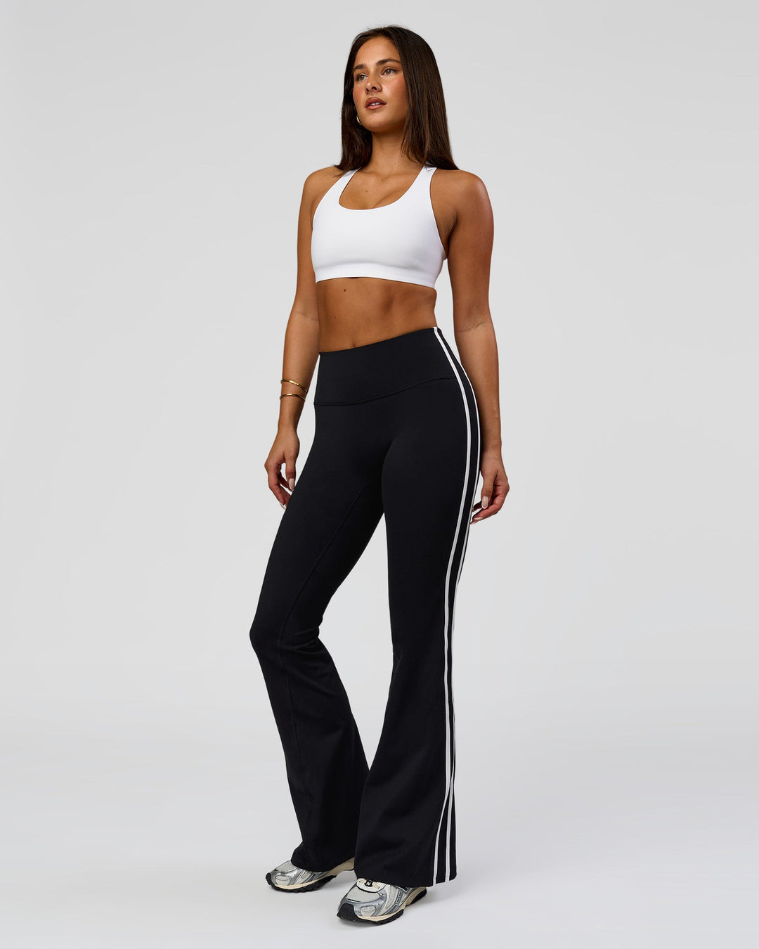 Woman wearing Fusion V-Contour Bind High-Rise Flared Legging - Black-white | Model:Bianca | Size:S - view 7