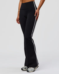 Woman wearing Fusion V-Contour Bind High-Rise Flared Legging - Black-white | Model:Bianca | Size:S | Thumbnail Index: 4