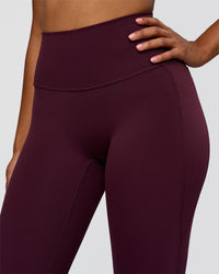 Woman wearing Fusion V-Contour High-Rise Flared Legging Pockets - Cherry Lacquer | Model:Jordan | Size:S | Thumbnail Index: 6