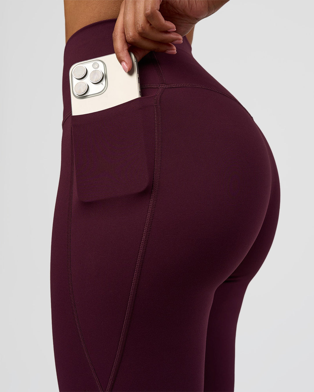 Woman wearing Fusion V-Contour High-Rise Flared Legging Pockets - Cherry Lacquer | Model:Jordan | Size:S - view 5