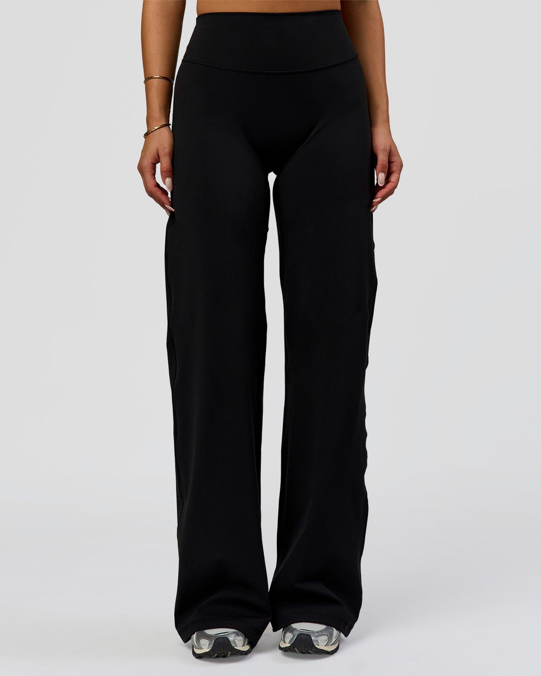 Woman wearing Fusion V-Contour High-Rise Pant - Black | Model:Bianca | Size:S