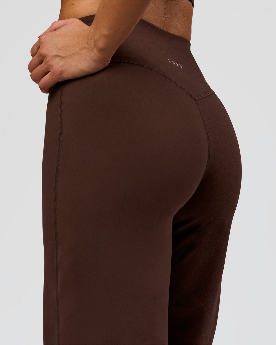 Woman wearing Fusion V-Contour High-Rise Pant - Hot Chocolate | Model:Bianca | Size:S
