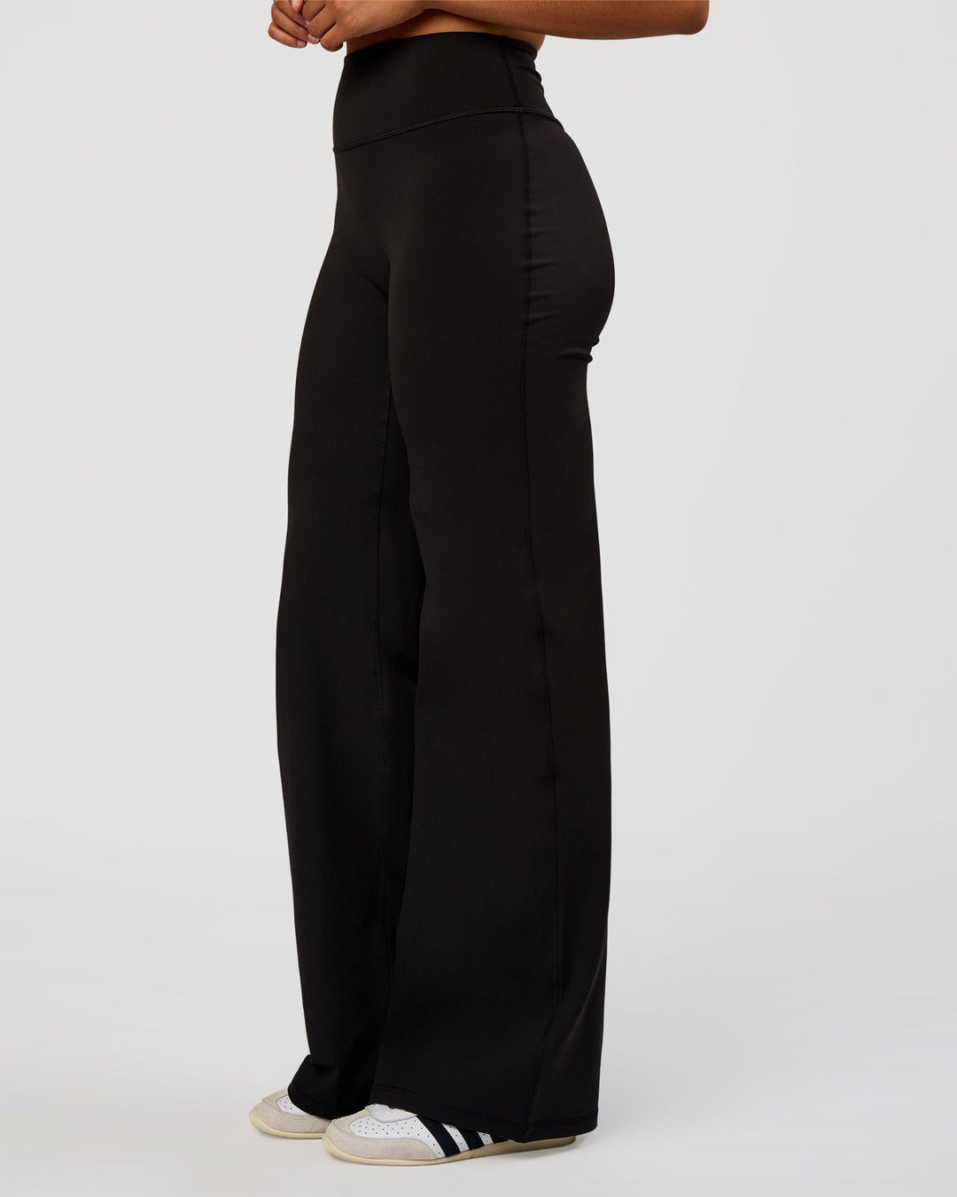 Woman wearing Fusion V-Contour High-Rise Tall Pant - Black | Model:Rosie | Size:S