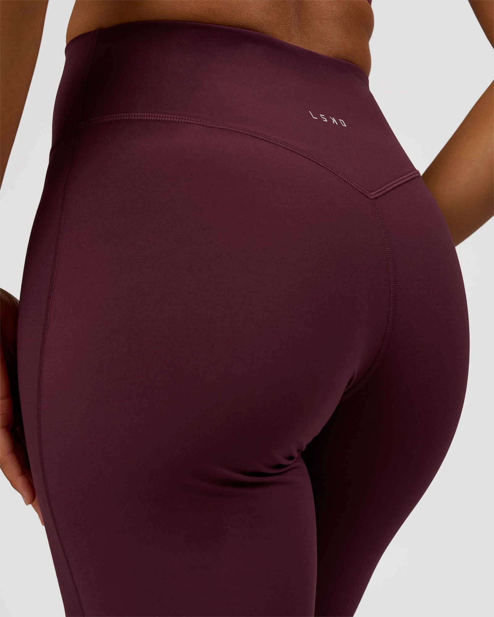 Woman wearing Fusion V-Contour High-Rise Tall Pant - Cherry Lacquer | Model:Rosie | Size:S