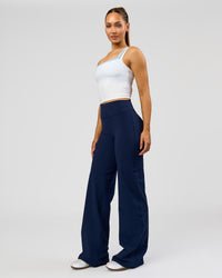 Woman wearing Fusion V-Contour High-Rise Tall Pant - Future Navy | Model:Claire | Size:S