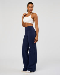 Woman wearing Fusion V-Contour High-Rise Tall Pant - Future Navy | Model:Rosie | Size:S