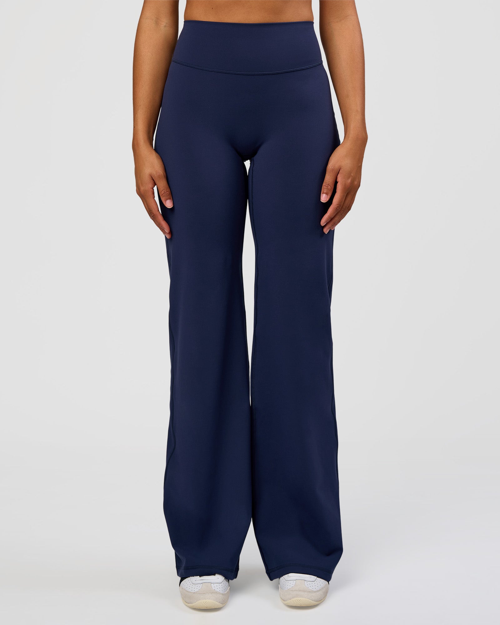 Woman wearing Fusion V-Contour High-Rise Tall Pant - Future Navy | Model:Rosie | Size:S