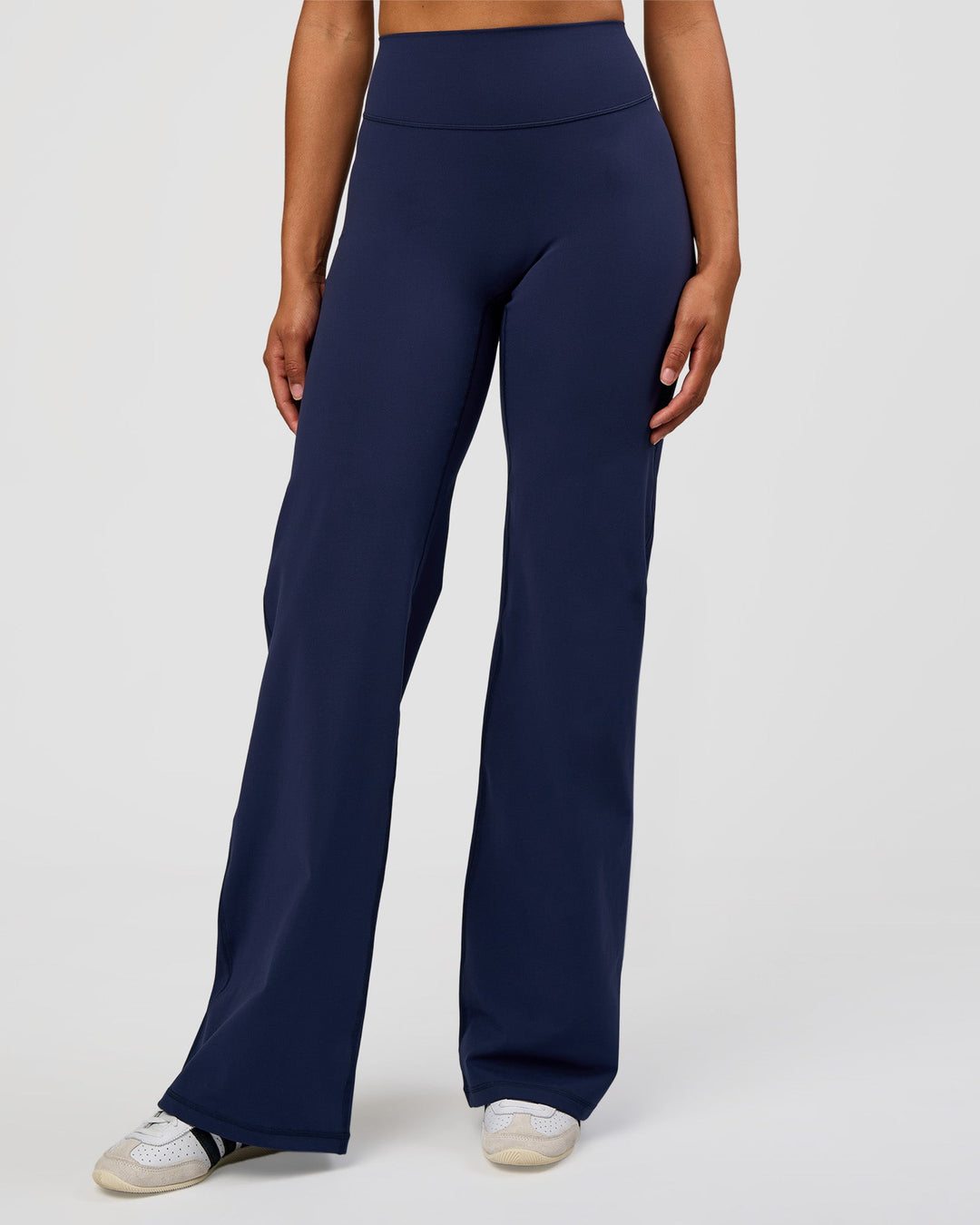 Woman wearing Fusion V-Contour High-Rise Tall Pant - Future Navy | Model:Rosie | Size:S