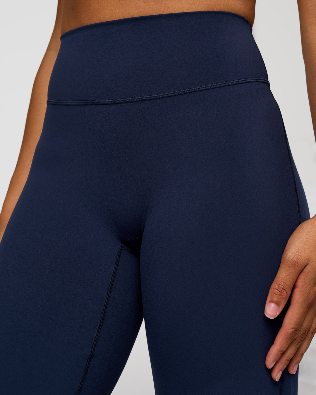 Woman wearing Fusion V-Contour High-Rise Tall Pant - Future Navy | Model:Rosie | Size:S